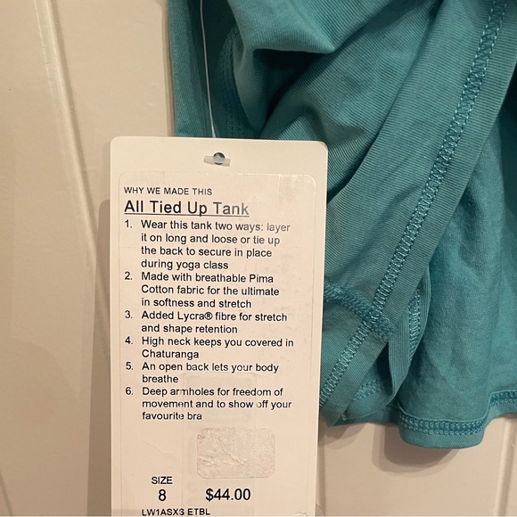Beautiful NWT light blue Lululemon All tied up tank!